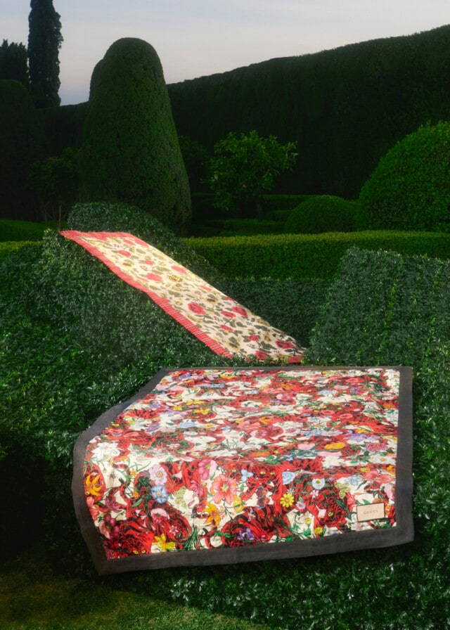 Floral Jacquard Wool Blankets from the new Gucci Décor collection in an English garden.