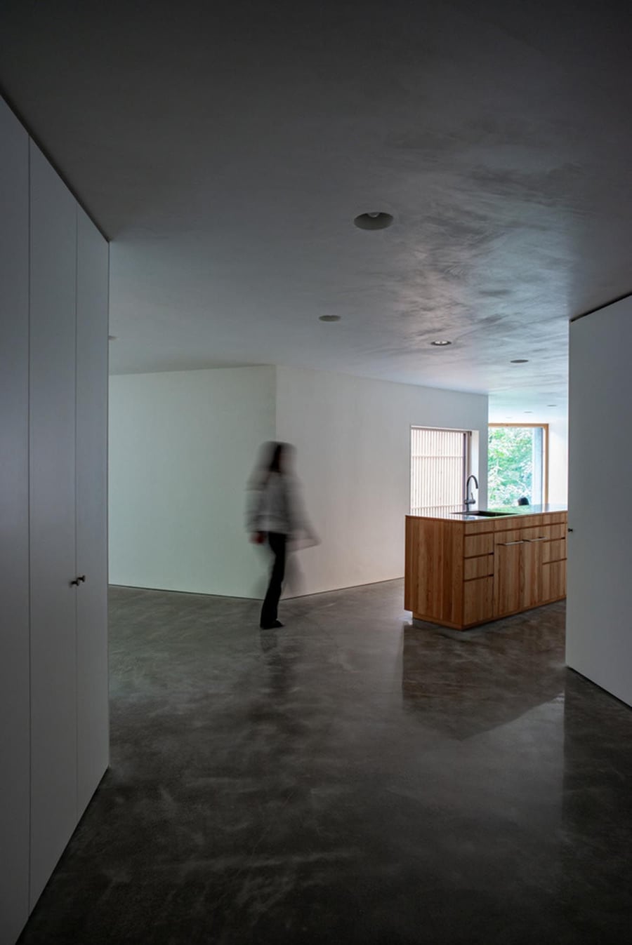 The inside of the House in the Forest is all white walls and timber doors - a minimalist's dream. 