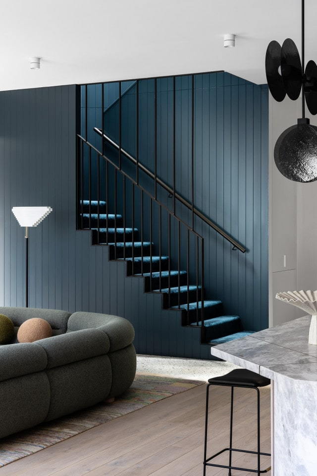 Navy blue staircase in the 