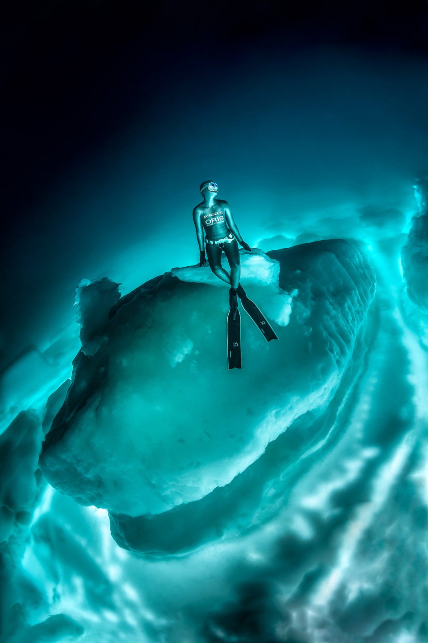 In this photo,  Friedrich can be seen sitting directly on a large chunk of underwater ice.