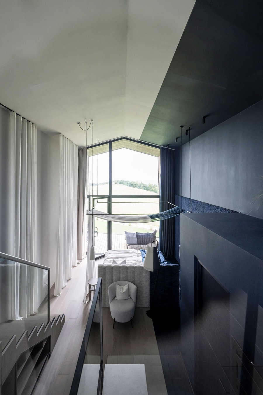 Expansive vertically-oriented Gallery Suite in the noa-designed AEON Hotel.