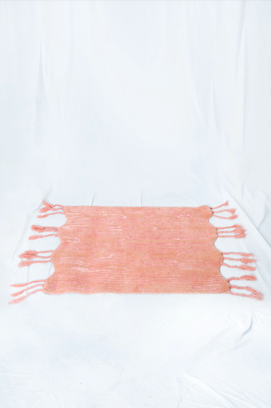 Soft pink hand-tufted rug featured in Batsheva Hay's Batsheva Home collection.