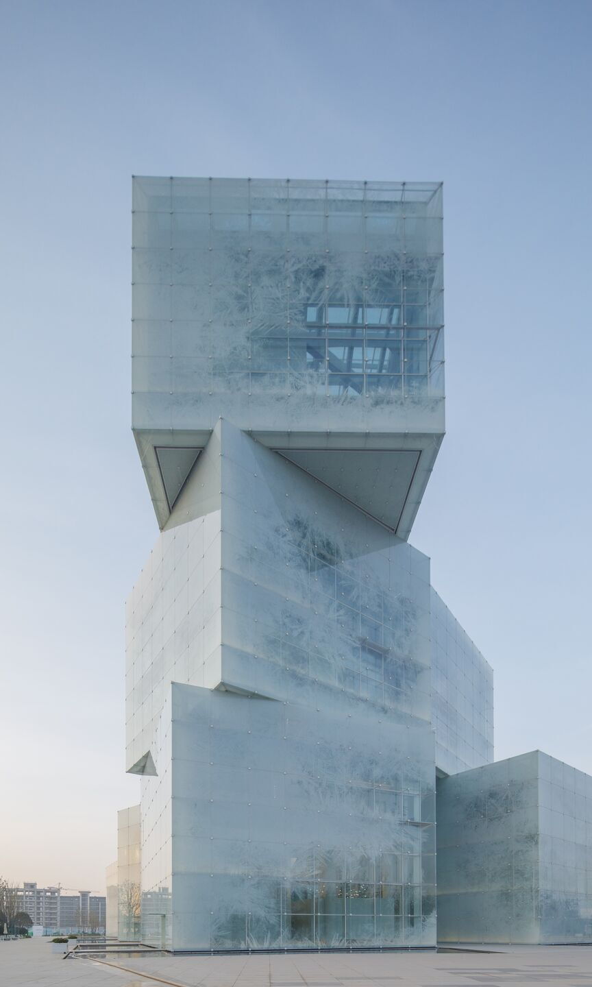 The Xinxiang Tourism Center stack takes on an entirely different shape when viewed from a different place on the ground. 
