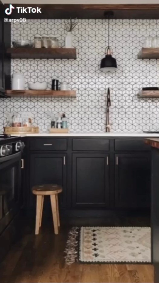 Darker kitchen cupboards and walls are finally in after years of a stale white stranglehold.