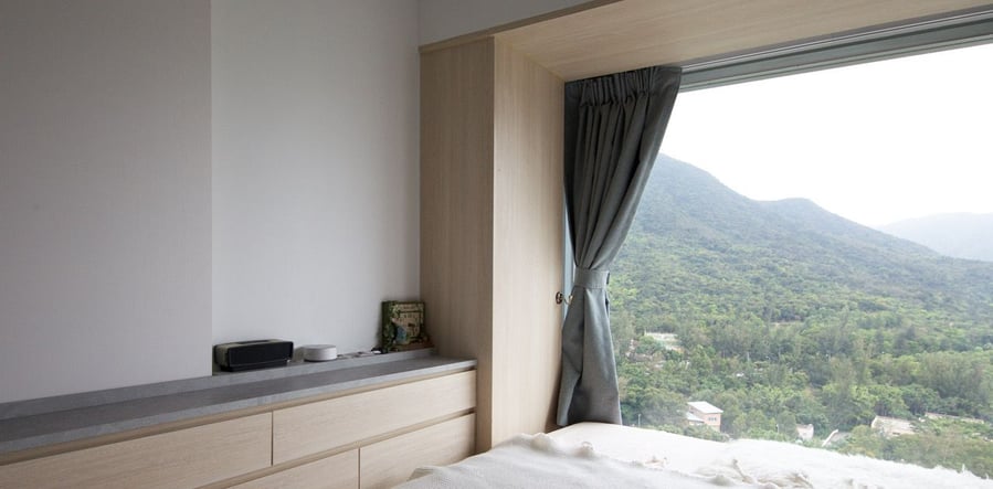 View out over gorgeous natural surroundings from the Smart Zendo apartment's master bedroom area.