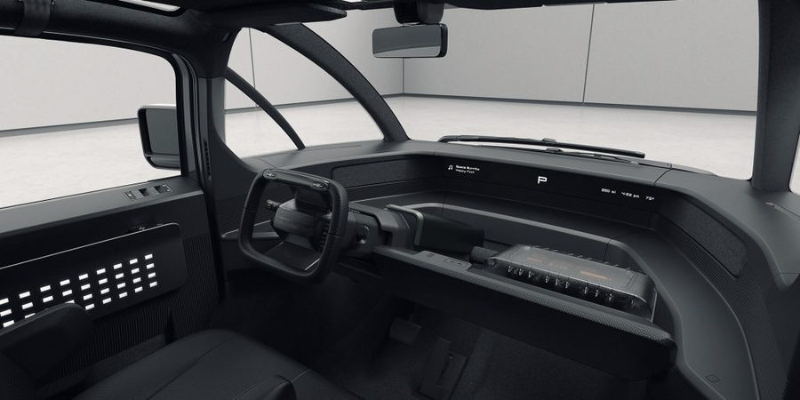 Inside view of the Canoo electric pickup truck's dashboard area.