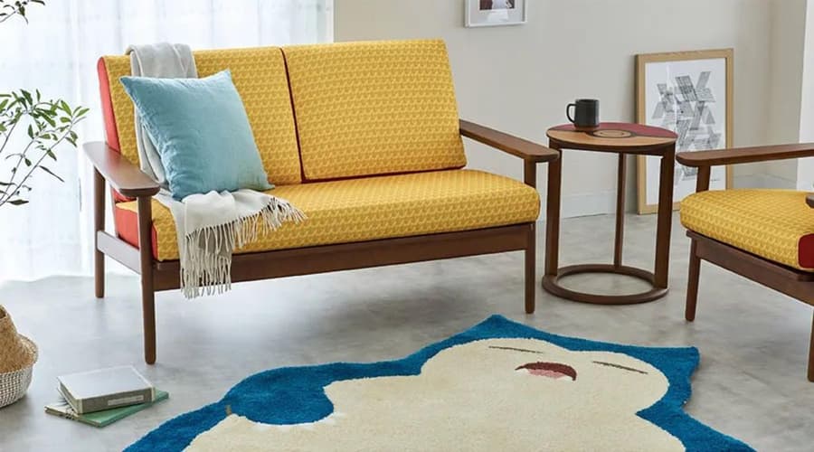Pikachu two-seater sofa and Snorlax rug featured in the Pokémon Center and Karimoku's collaborative new themed furniture collection.