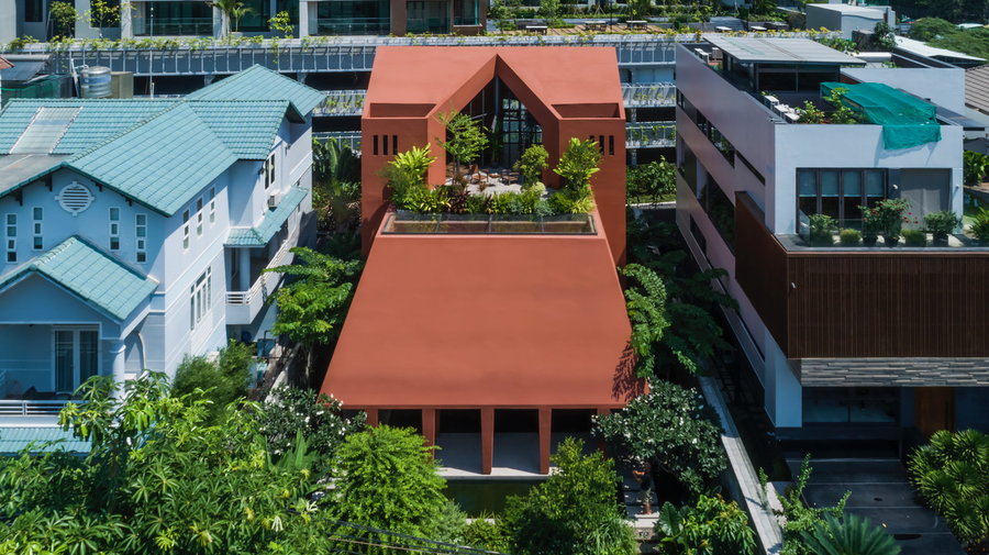 Nature-infused Red Cave house in Ho Chi Minh City, Vietnam.