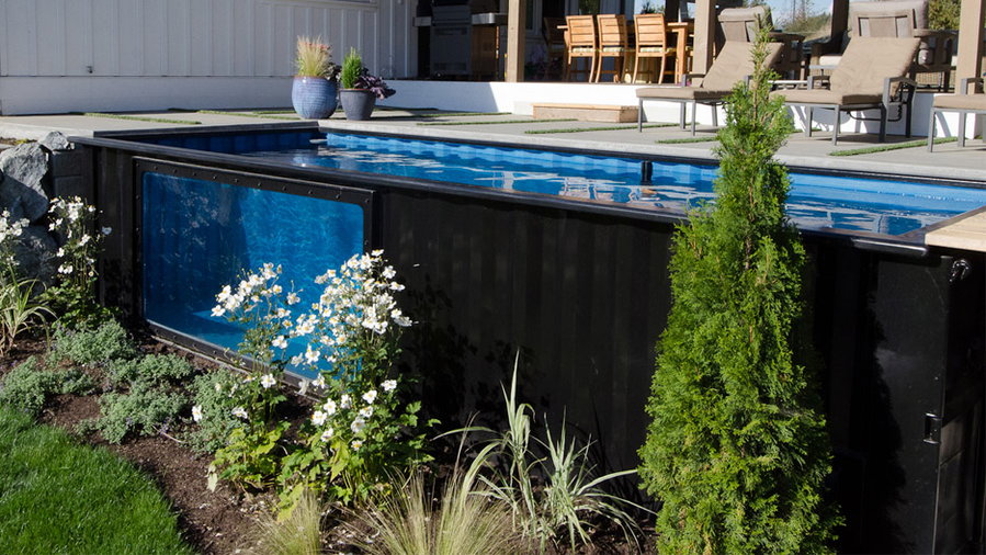 A sleek modern shipping container pool designed by Modpools.