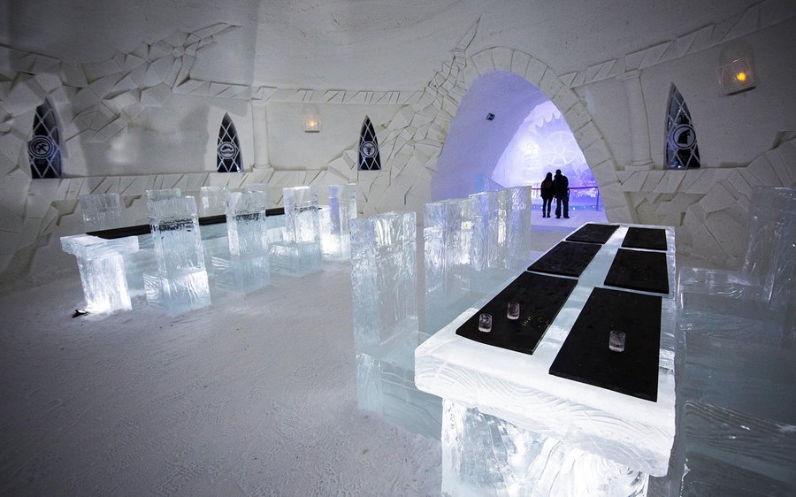 The all-white restaurant inside the Lapland Hotels SnowVillage 