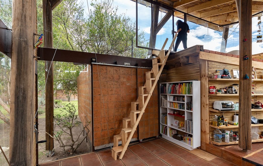 Ladders allow the home's inhabitants to move from floor to floor in a fun, refreshing way.