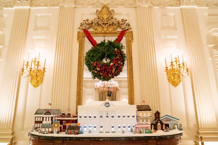 The official 2021 White House gingerbread house, complete with a quaint gingerbread village built around it.