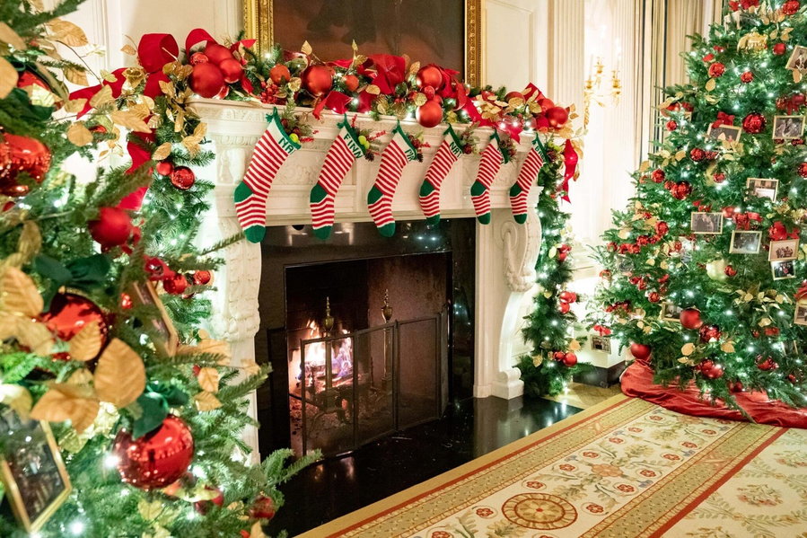 Stockings in the State Dining Room embroidered with the names of the Biden grandchildren represent 