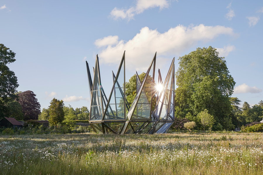 Thomas Heatherwick's sculptural Glasshouse unfurls like a flower during the warmer months.