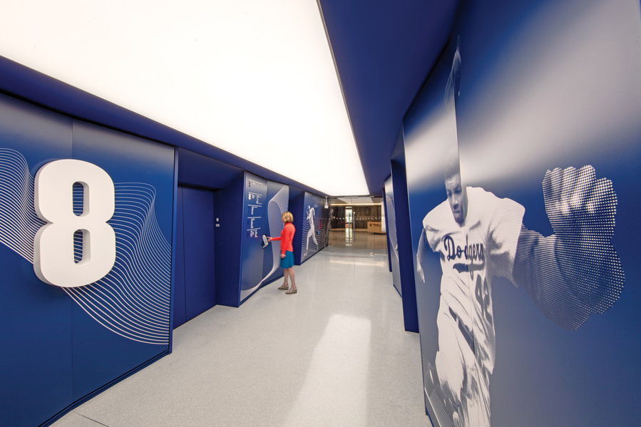 Oversized baseball artwork, numbers, and colors adorn the halls of the new MLB headquarters. 