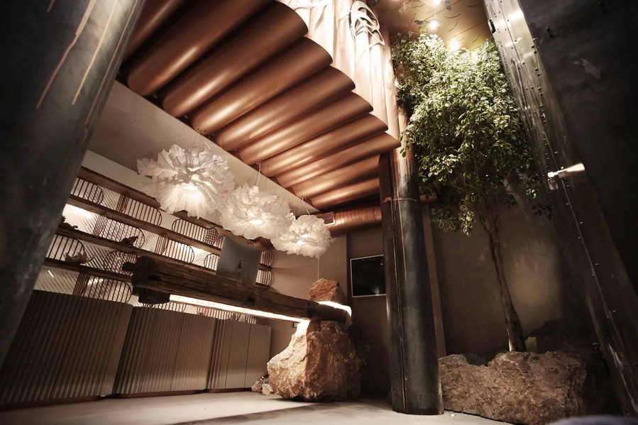 The sleek sculptural reception desk in Kosovo's new Angel Salon