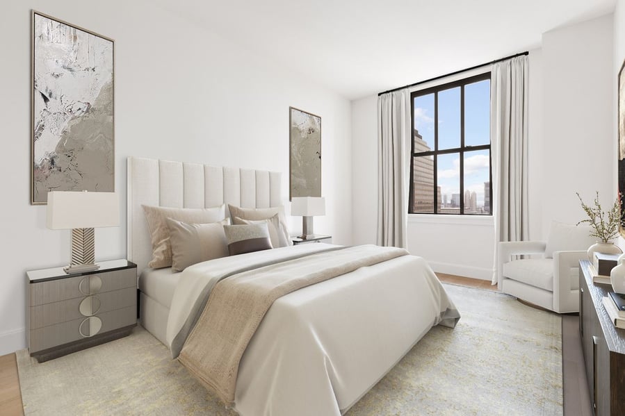 Light, bright bedroom space inside Condo 20B at the historic 100 Barclay Street.