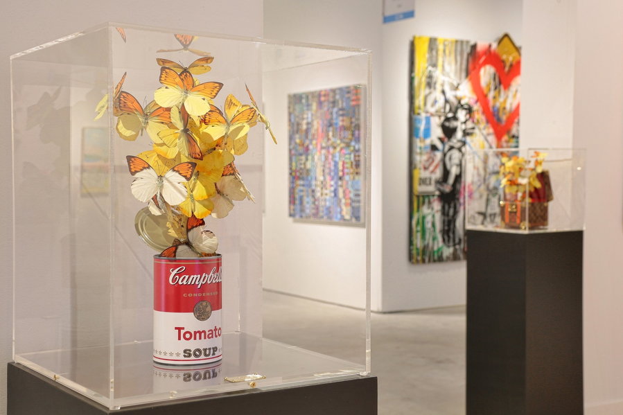 In this piece, Feral's butterflies seem to burst forth from Andy Warhol's iconic Campbell's Tomato Soup can.