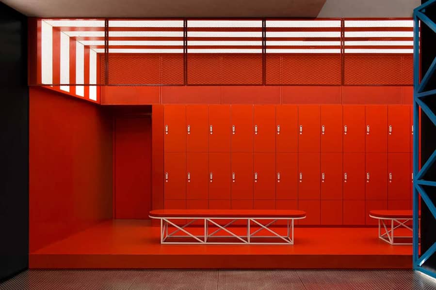 The sleek monochromatic locker room inside Beijing's new MFIT SPACE 01 gym. 