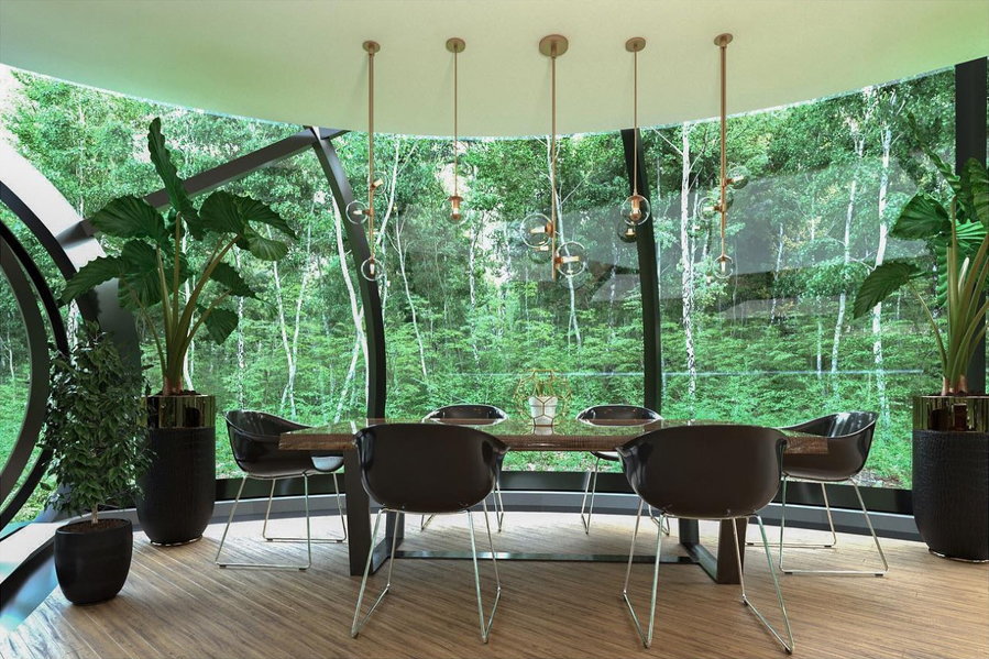 Contemporary dining area in the Living O'Pod rotating dome home.