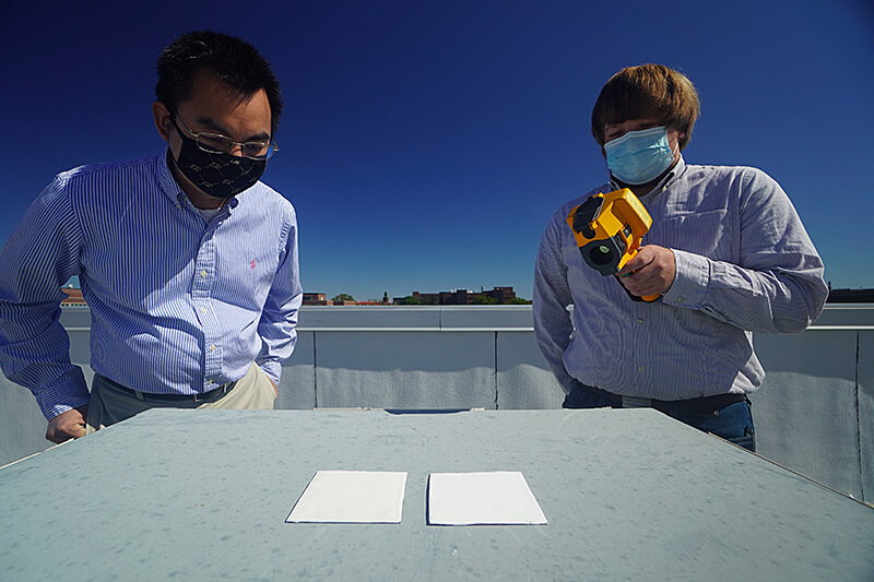 Researchers test out Purdue University's new climate change-fighting ultra-white paint.
