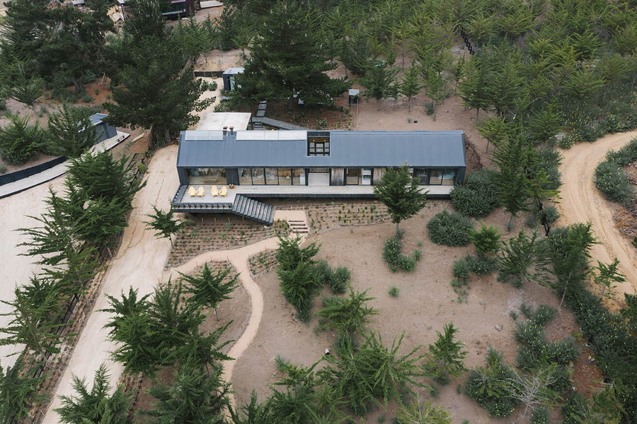 Aerial View of the M House gives a better look at the structure's A-frame roof.