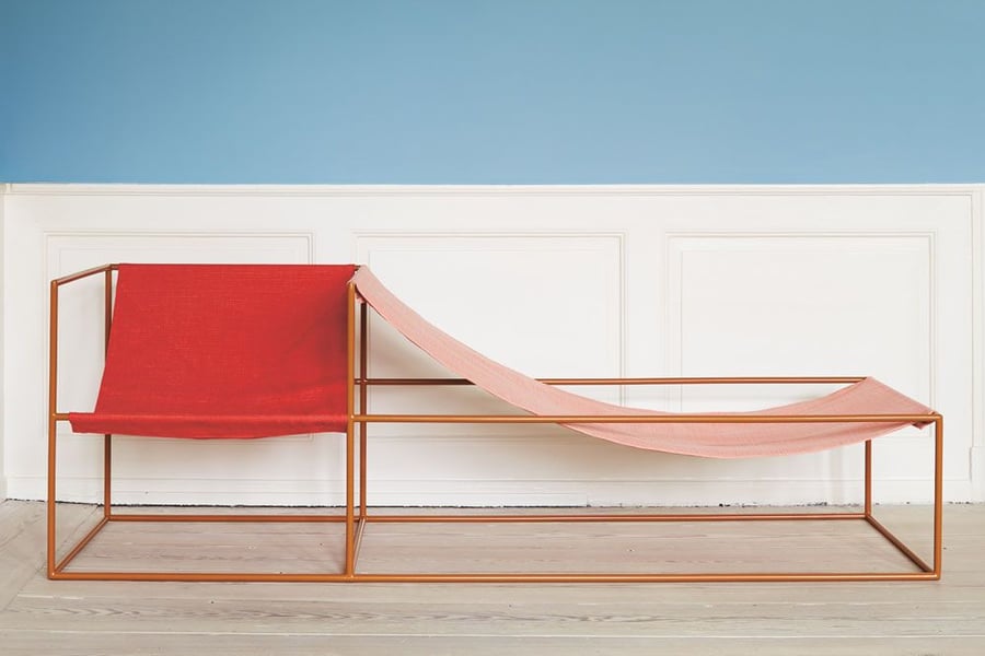 A colorful, sculptural dual seat from furniture design duo Muller Van Severen.