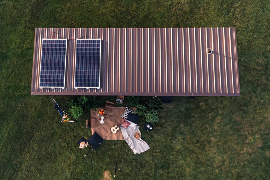 Aerial view of IKEA's tiny home offering made in collaboration with Escape, with two small solar panels visible on the left. 