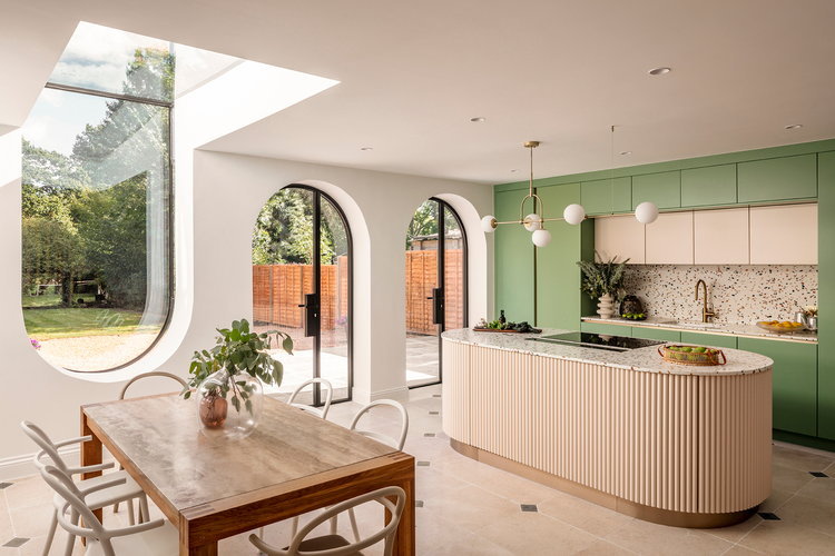 Closed kitchen cabinets give this contemporary space a clean, organized look.