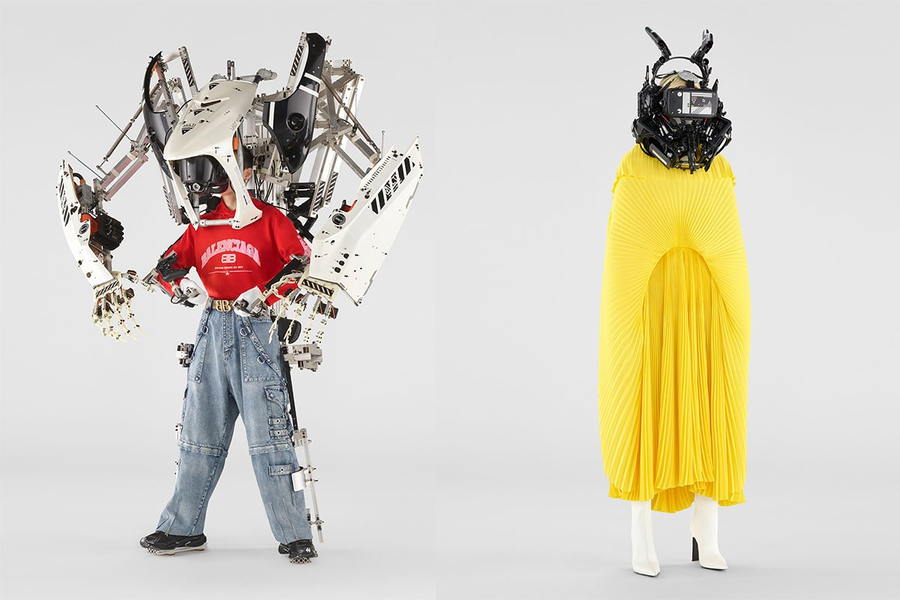 Models sport the robotic exoskeleton and masks designed by Hiroto Ikeuchi for Balenciaga's Spring 22 Campaign.