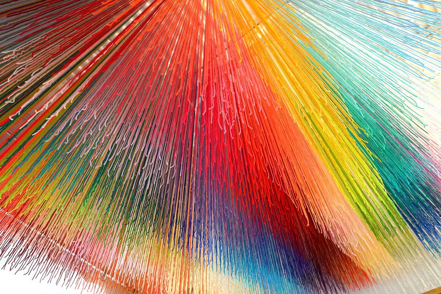 Close-up look at one of HOTTEA's rainbow-like yarn installations.