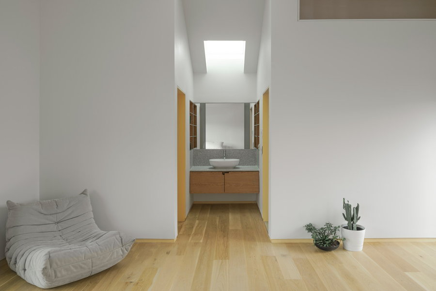 Minimalist white interiors in the new section of the 