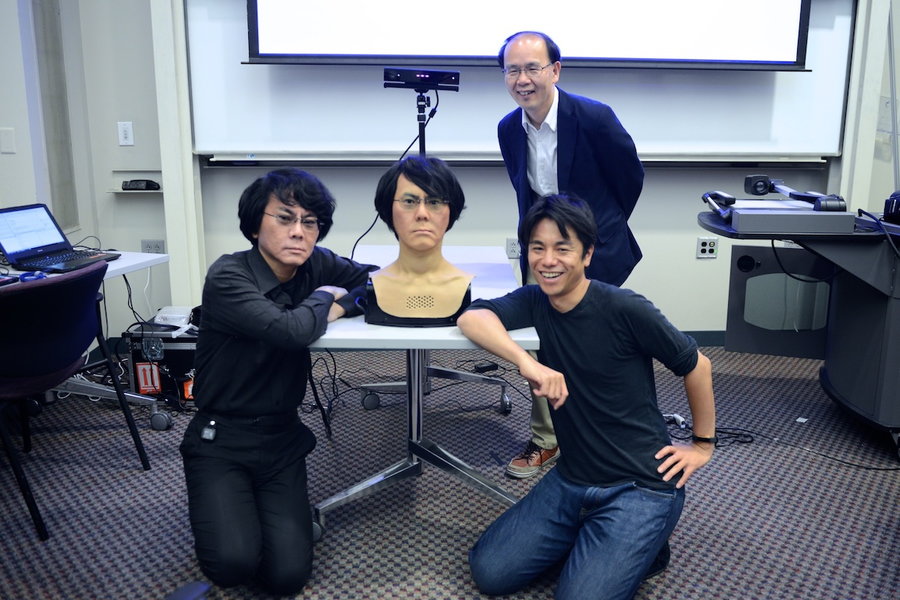 Erica's creator Hiroshi Ishiguro poses with his 