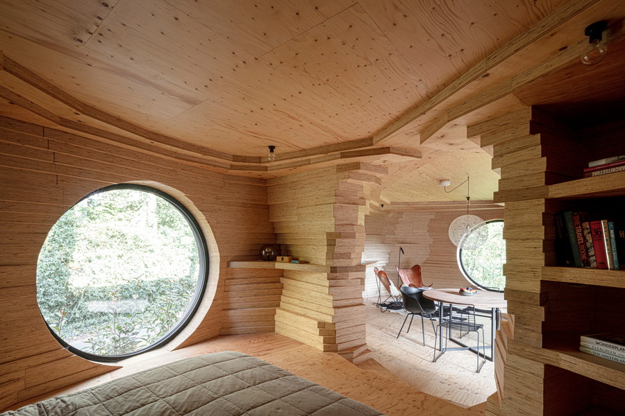 Depending on where you are inside it, the interiors of this guest house can feel incredibly open or incredibly cave-like.