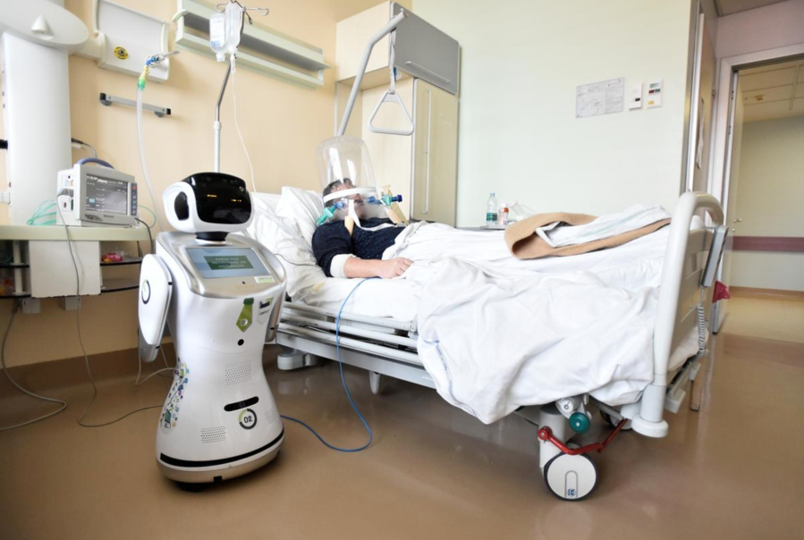 A medical robot in Italy helps tend to a patient afflicted by the novel coronavirus.