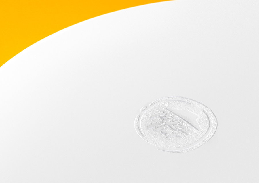 A small white Pizza Hut logo adorns the center of IKEA's new Säva Table.
