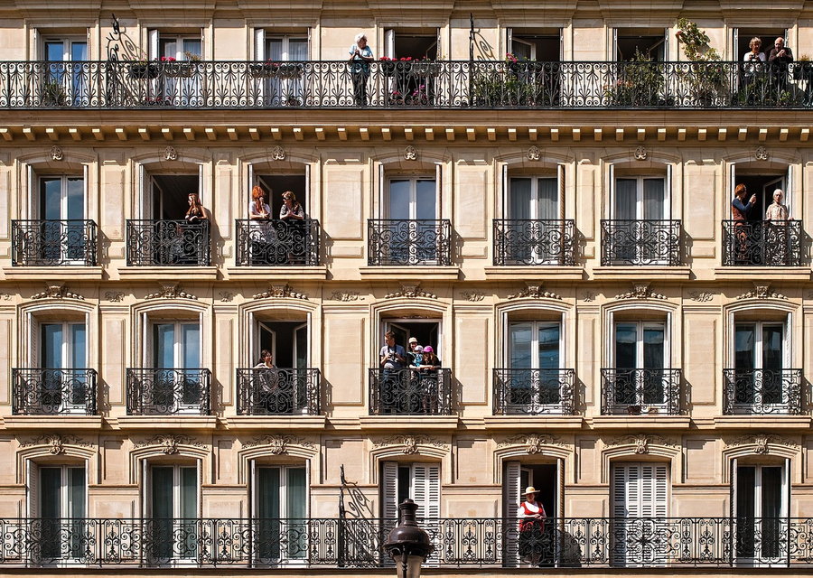 Facade of a classic Haussmann apartment building in Paris.