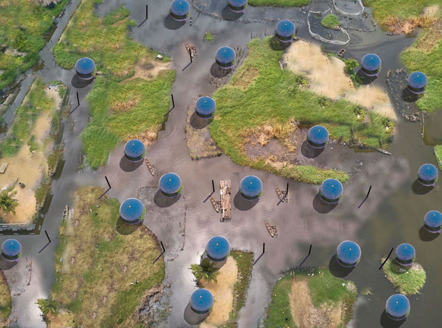 Aerial view of Puffer Village housing pods in a swampy area.