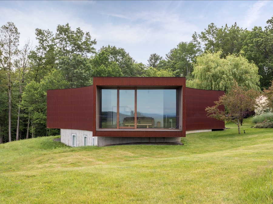 The guest house of the Tsai Residence is clad in a rusted Corten steel. 