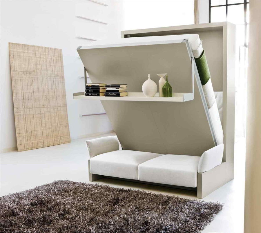 This convertible bed can be folded up to make the room it's in feel much, much bigger