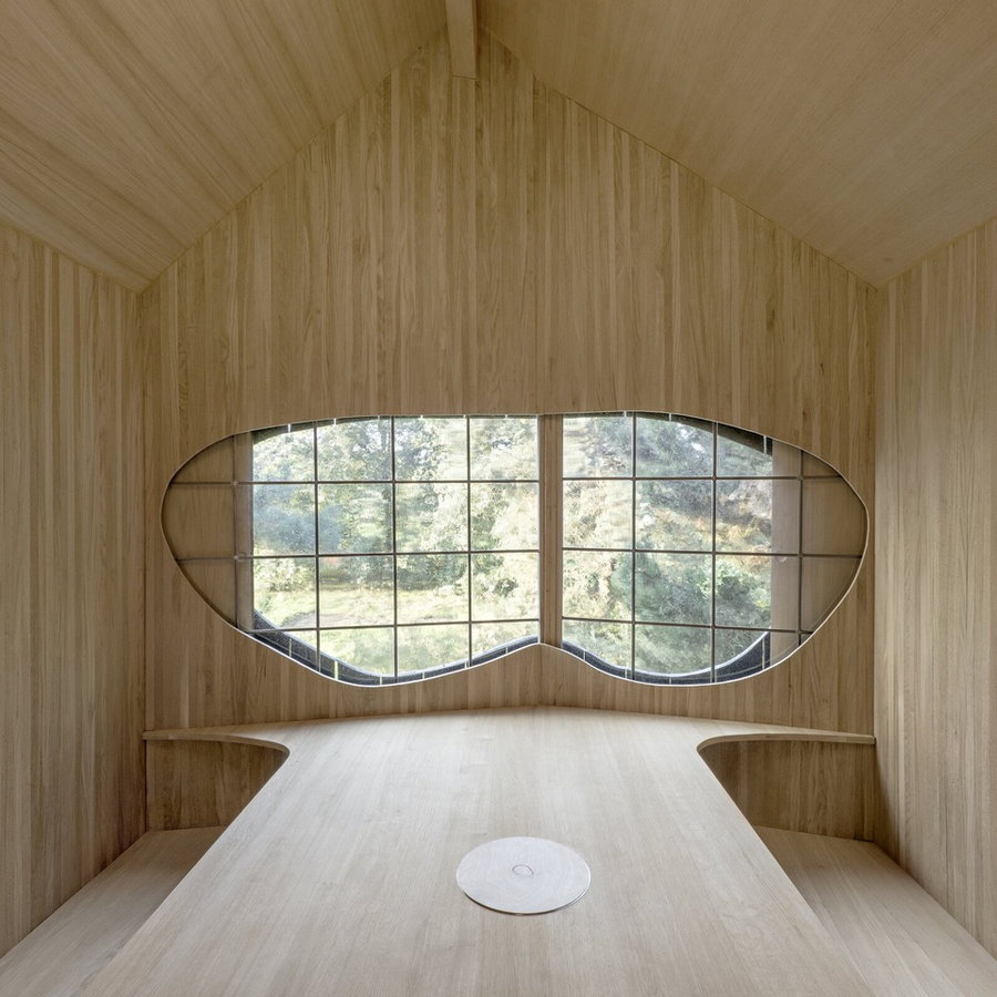 The inside of the tea house is simple, spacious, and teeming with natural light.