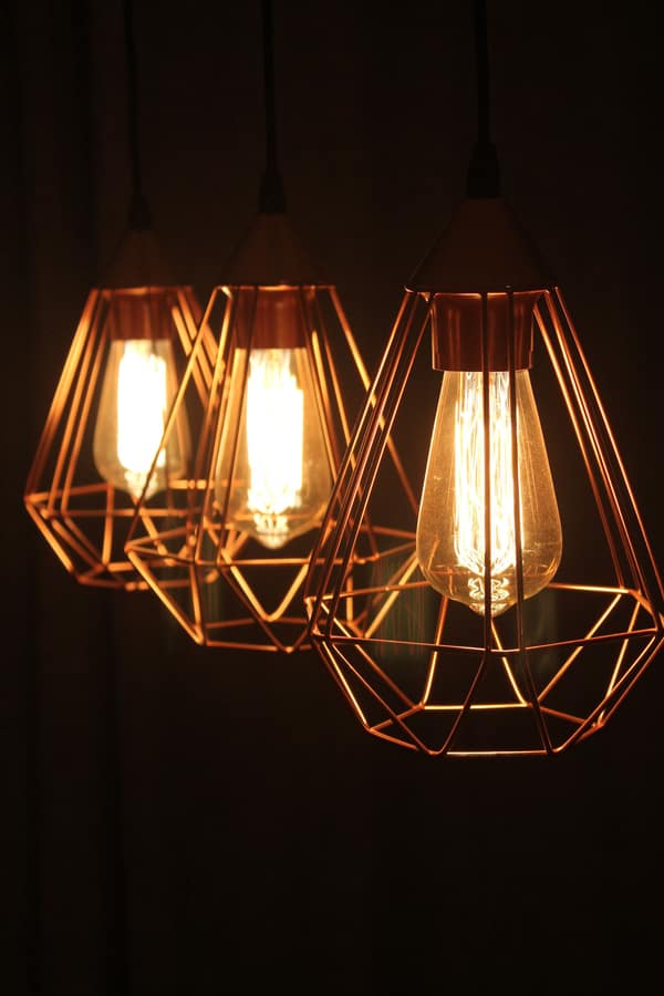 Geometric brass lamps like these make for tasteful modern additions to almost any home