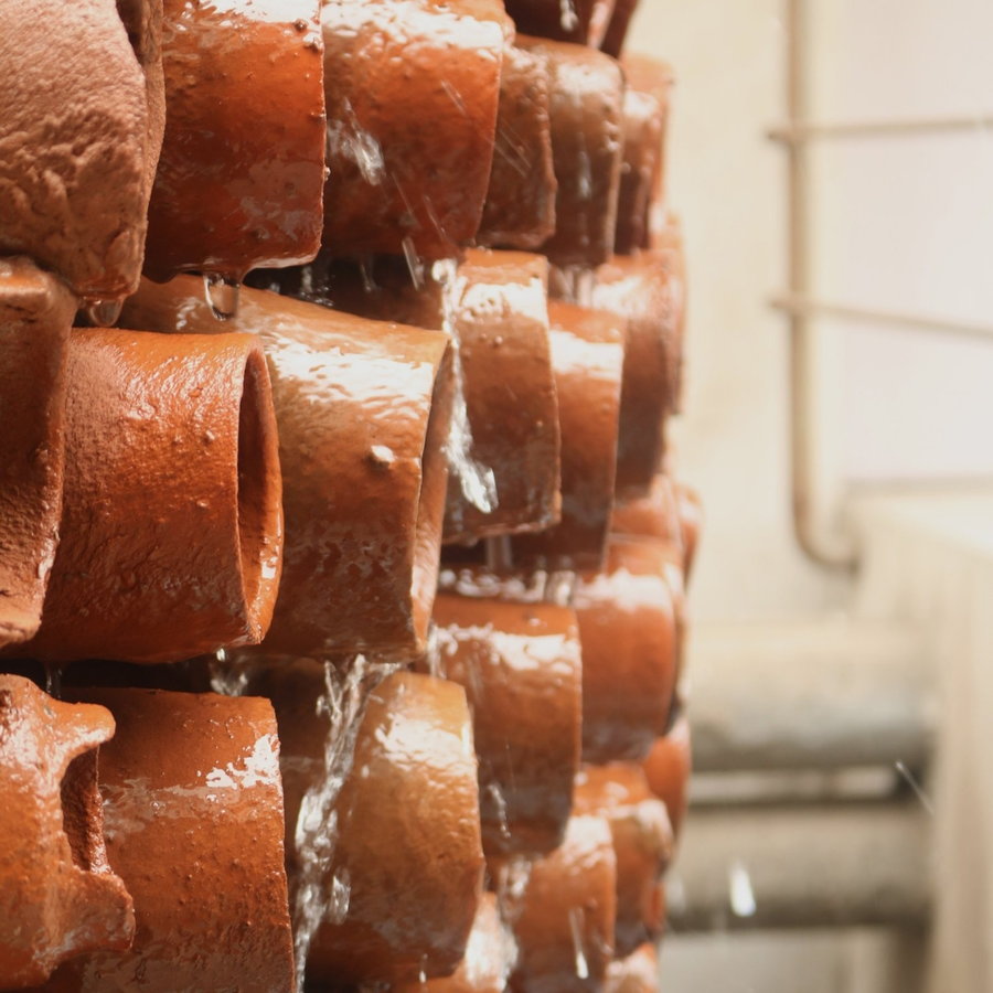 Close up of the terracotta pipes that form Ant Studio's Beehive evaporative cooling system. 