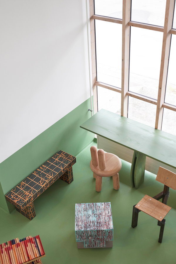 Unique seating from 25 international artists makes the inside of Copenhagen's Connie-Connie Café truly one of a kind.