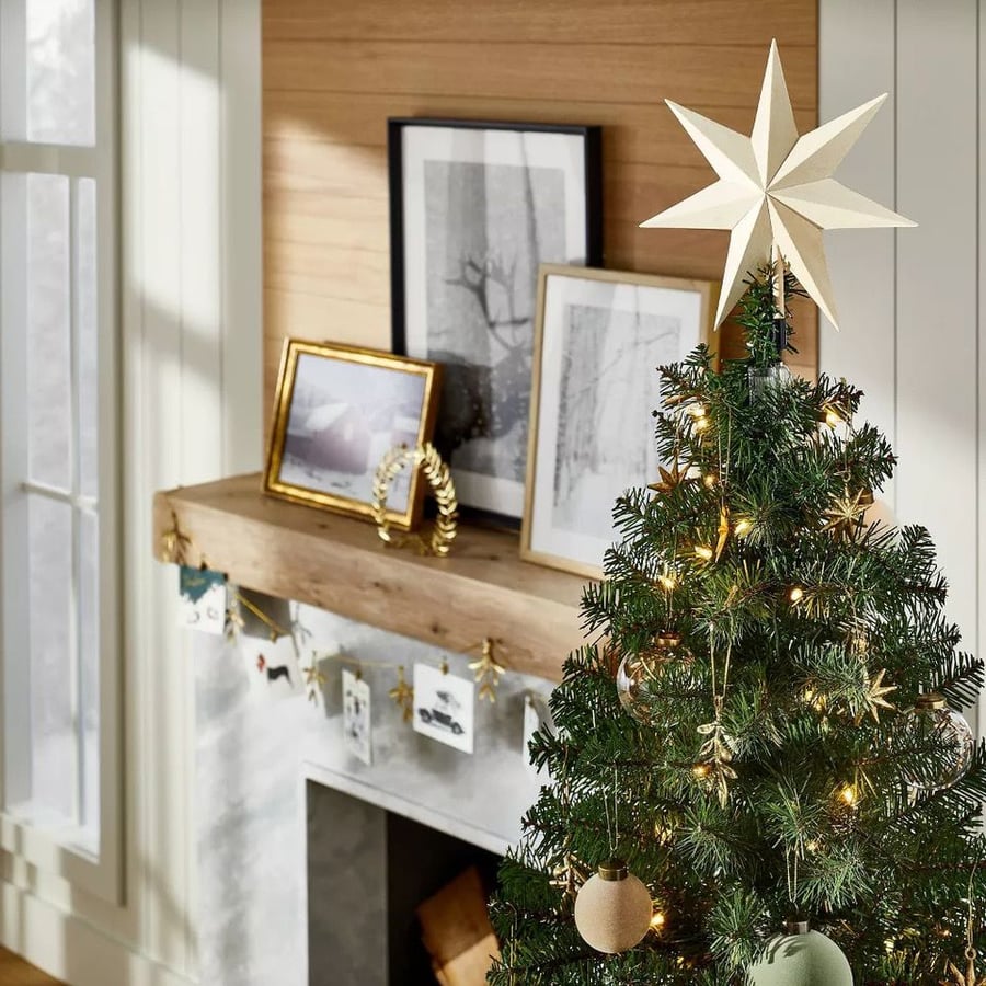 Pale wood tree topper featured in Target's 2022 Threshold x Studio McGee holiday collection.