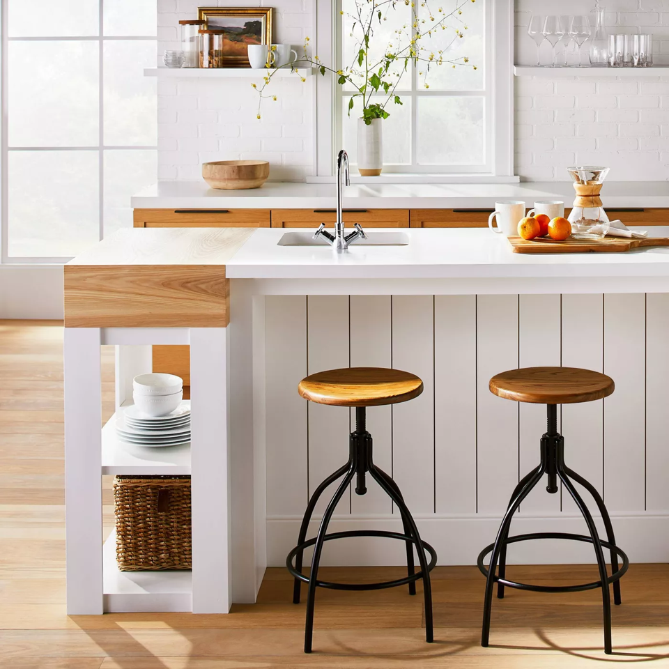The snazzy Industrial Adjustable Metal Base Counter Height Stools featured in Target and Studio McGee's collaborative line of fall decor. 