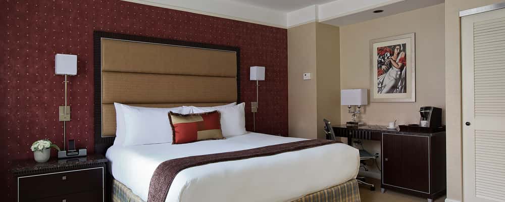 Our Premier King is a large room well designed for functionality and comfort, with a Keurig coffeemaker and mini-refrigerator stocked with welcome beverages (non-alcoholic).
