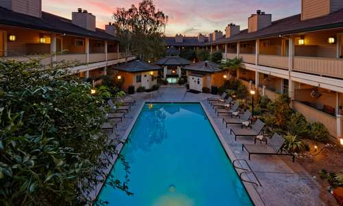 Heated saltwater pool and covered whirlpool. Heated saltwater pool and covered whirlpool.
