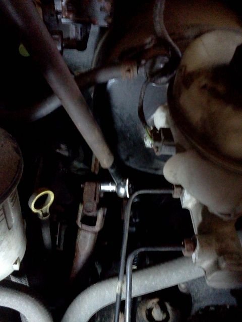 F150 Replace Lower Steering Shaft Ford Trucks Lower Steering Shaft Bolt With Socket Wrench