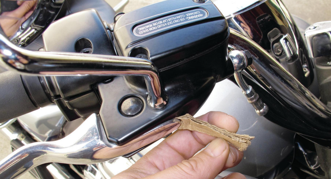 Dyna Glide Place cardboard between brake lever and assembly